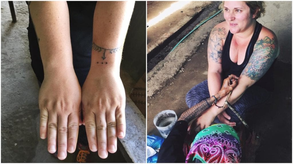 The author, Kelly Lewis, getting a tattoo from Apo Whang-Od © | Kelly Lewis