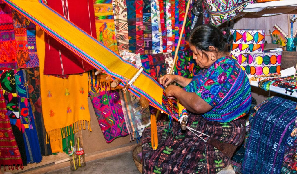 Mayan woman weaving with strap loom in Antigua, Guatemala | © Aleksandar Todorovic/Shutterstock