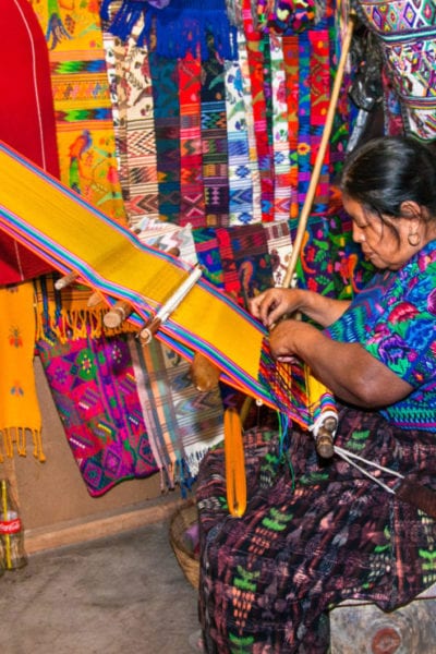 Mayan woman weaving with strap loom in Antigua, Guatemala | © Aleksandar Todorovic/Shutterstock