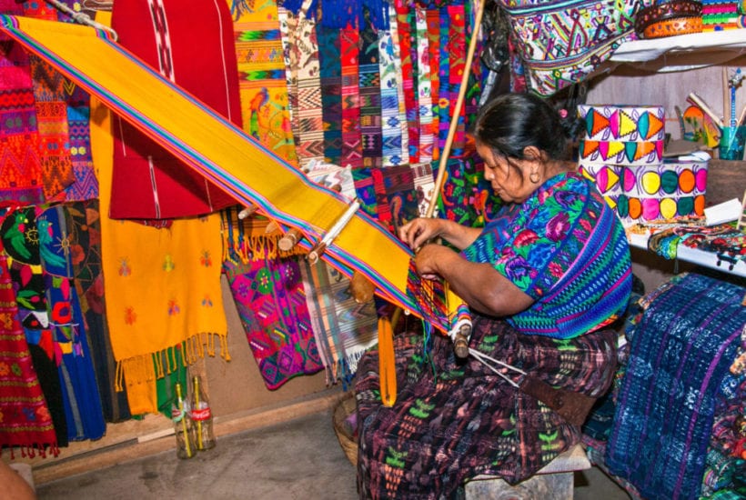 Mayan woman weaving with strap loom in Antigua, Guatemala | © Aleksandar Todorovic/Shutterstock