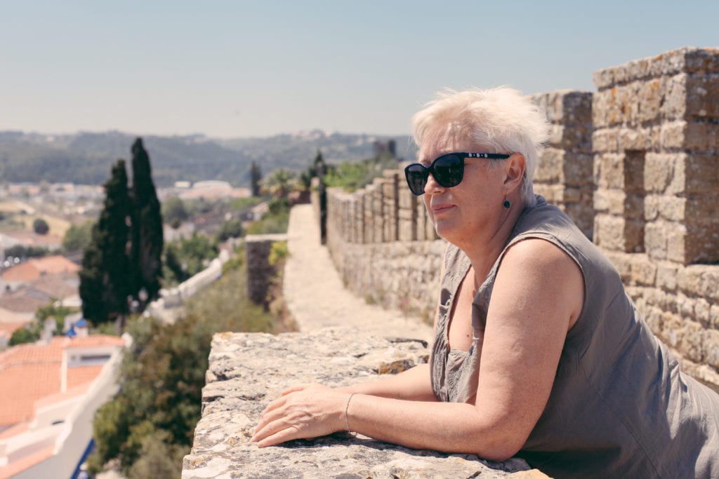 An older woman travel solo in Europe © | dabyki.nadya/Shutterstock