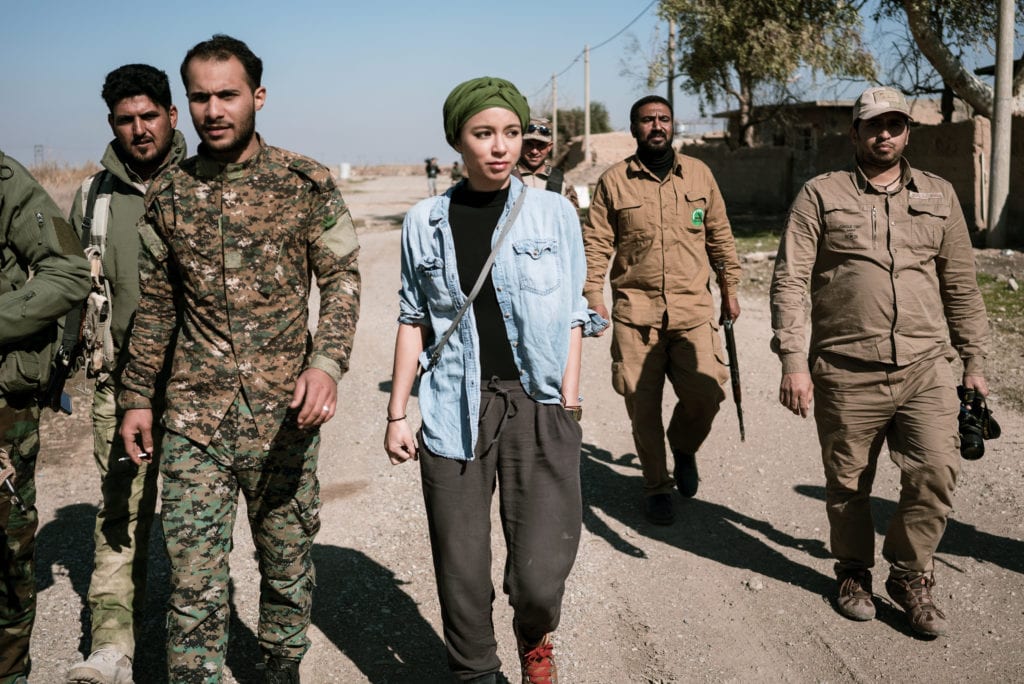 VICE correspondent Isobel Yeung walks with the Badr Brigade, a shia militia, searching for ISIS fighters in one of the last ISIS strongholds in Iraq. | © Courtesy of VICE HBO