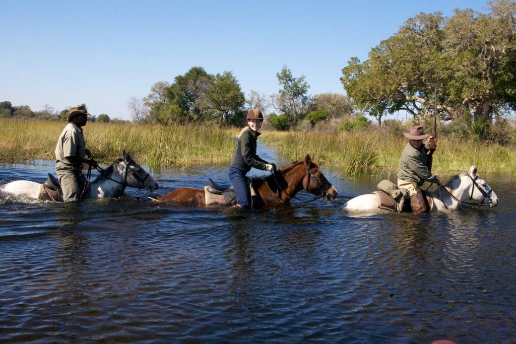 Horseback riding on Botswana’s Okavango Delta | © Travels with Darley