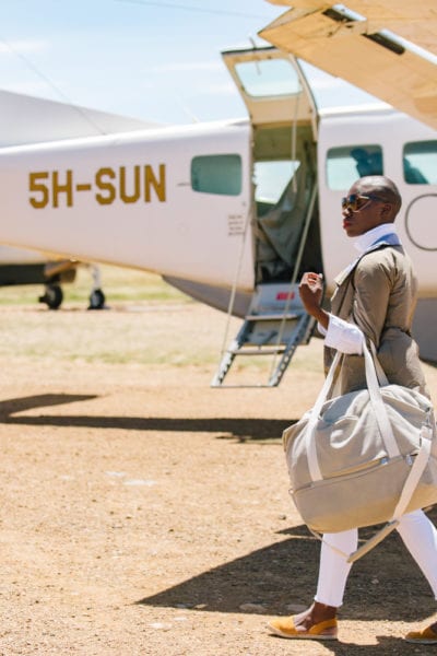 Jessica Nabongo in the Serengeti in Tanzania | © Elton Anderson