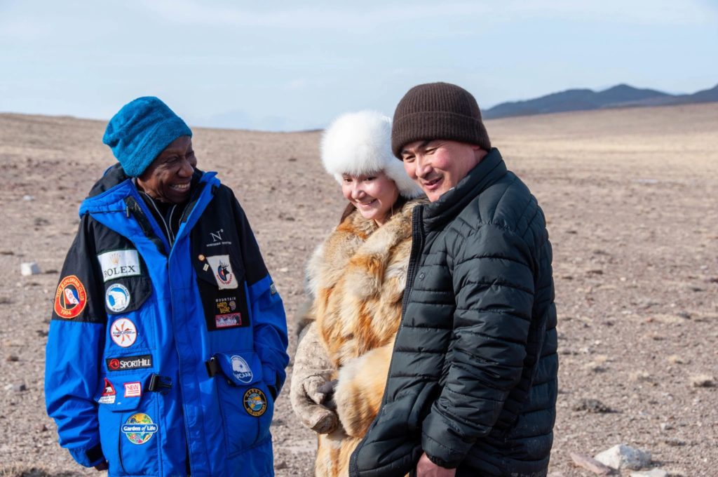 The late and great Barbara Hillary on her final expedition to Mongolia. With her, her guides, Tudevee, and Akelik, who hunt with eagles. | © Zachary Murray/Big Mongolia Travel