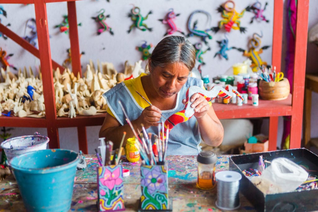 Artists of the woodcarving artisan village of San Martin Tilcajete in Oaxaca | © Kelli Hayden / Shutterstock