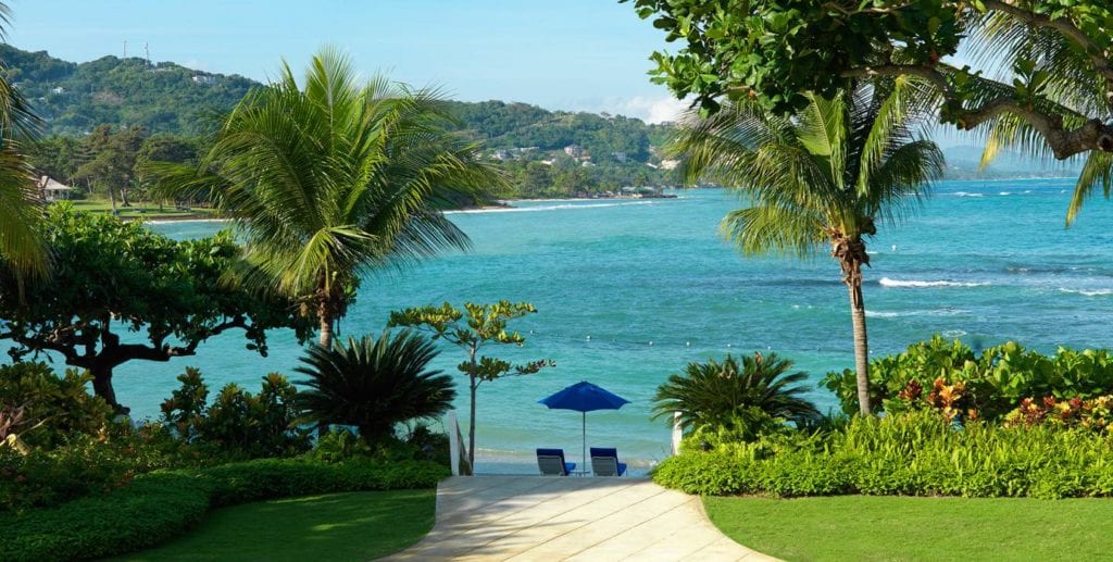 A path leads to the private beach at Round Hill Resort in Jamaica | © Courtesy of Round Hill Resort