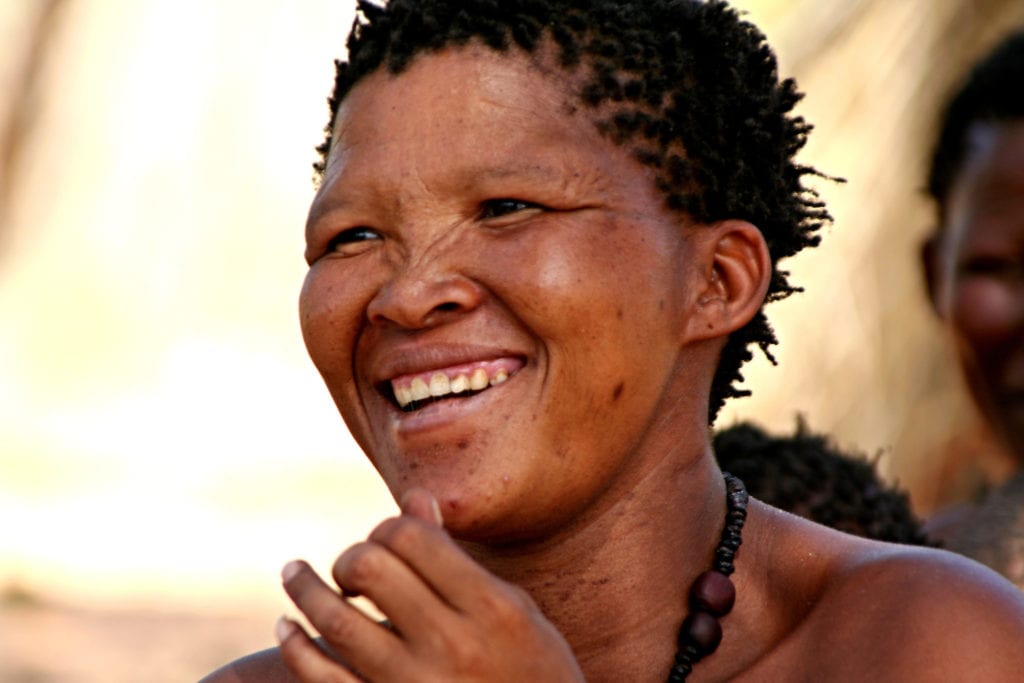 A local San woman smiles in a candid shot | © Rostasedlacek/Shutterstock