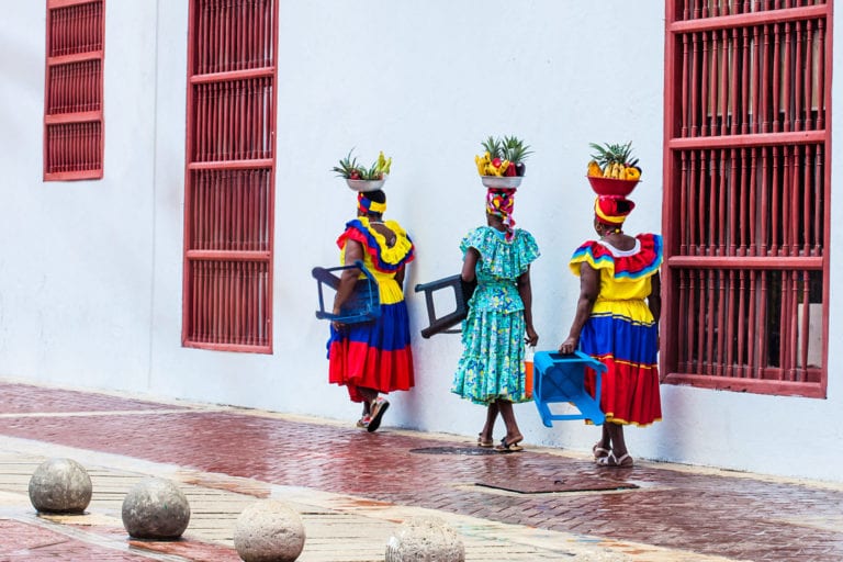 Local women walk the streets of Cartagena | © Anamaria Mejia/Shutterstock