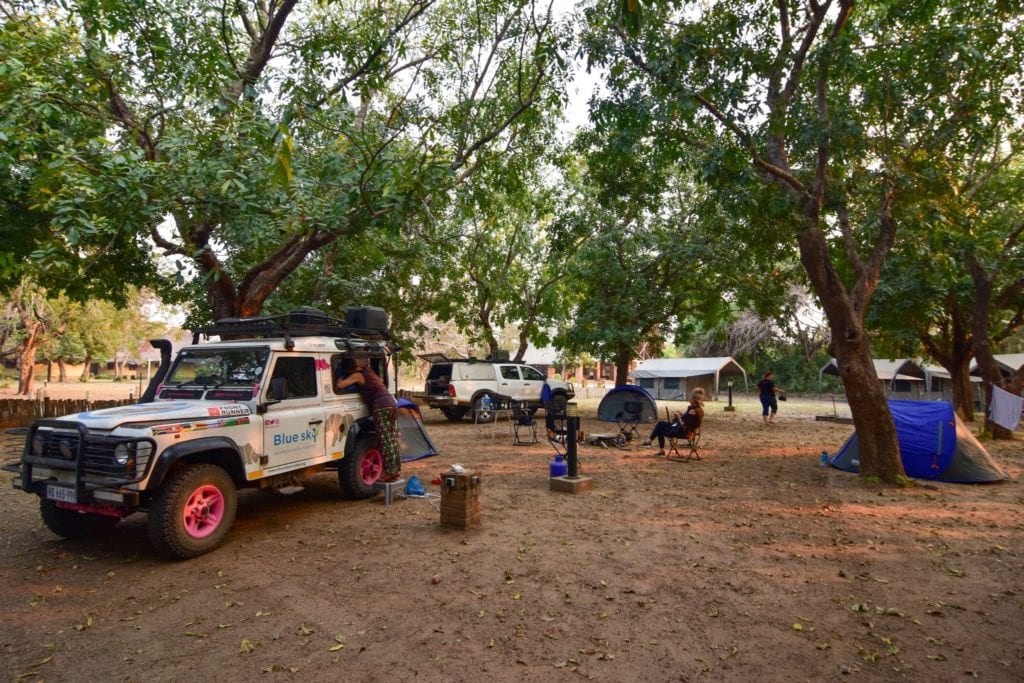 Setting up camp in Gorongosa National Park's recently refurbished Chitengo campsite | © Emily Scott/ Blue Sky Society