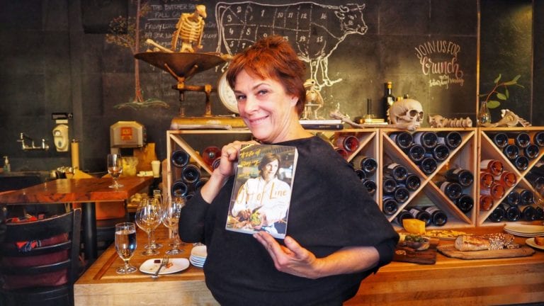 Chef Barbara Lynch poses with her new memoir | © Nikki Vargas/Unearth