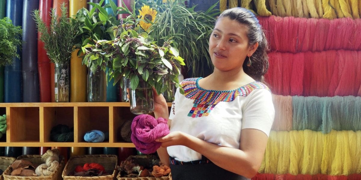 Johana of Casa Flor Ixcaco shows what plants are used for the natural dyes | © Nikki Vargas/Unearth Women