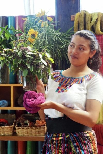Johana of Casa Flor Ixcaco shows what plants are used for the natural dyes | © Nikki Vargas/Unearth Women