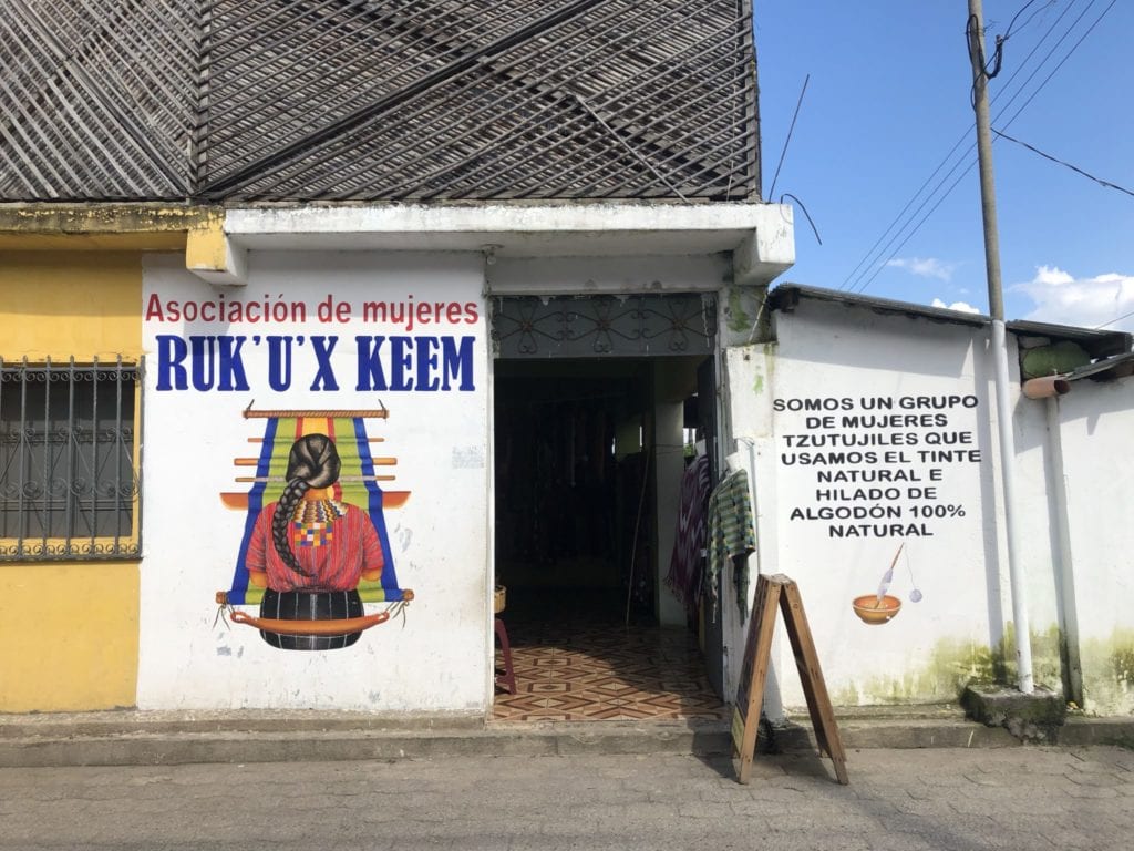 One of many women's association signs in San Juan La Laguna, Guatemala  | © Nikki Vargas/Unearth Women