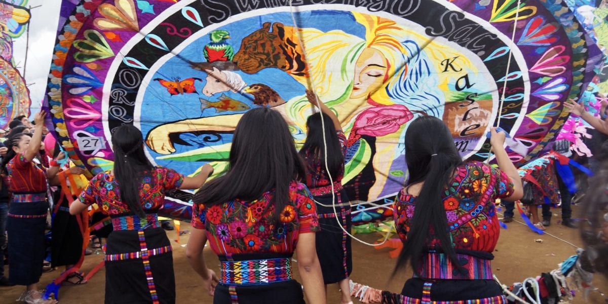 The Orquideas Oficial get ready to fly their handmade kite at Guatemala's kite festival in Sumpango | © Nikki Vargas/Unearth Women