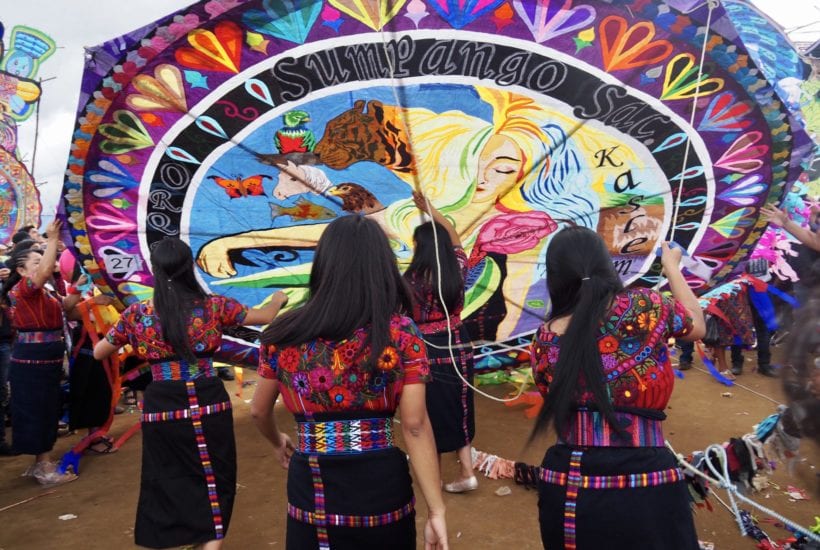 The Orquideas Oficial get ready to fly their handmade kite at Guatemala's kite festival in Sumpango | © Nikki Vargas/Unearth Women