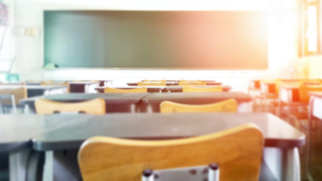 An empty classroom during the Coronavirus pandemic | © BlurryMe/Shutterstock