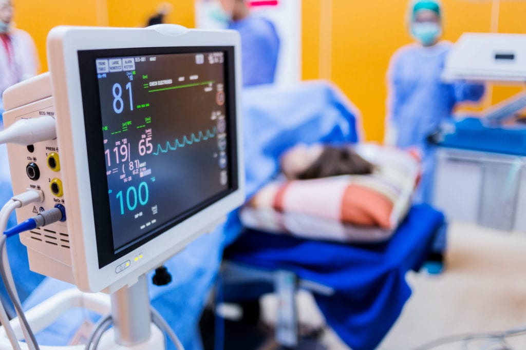 An EKG machine within a busy ICU An empty classroom during the Coronavirus pandemic | © Shutterstock