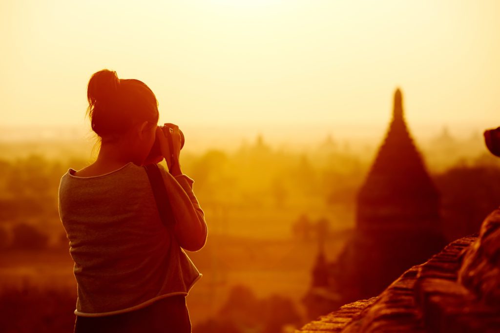 Female,Traveler,Photographing,Temples,At,Bagan,Myanmar,Asia,At,Sunrise