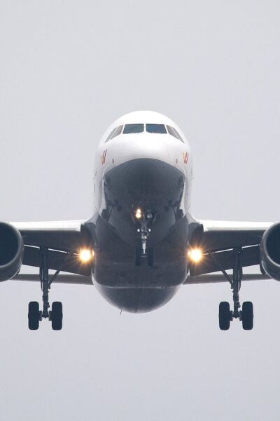 time lapse photography of white commercial airplane
